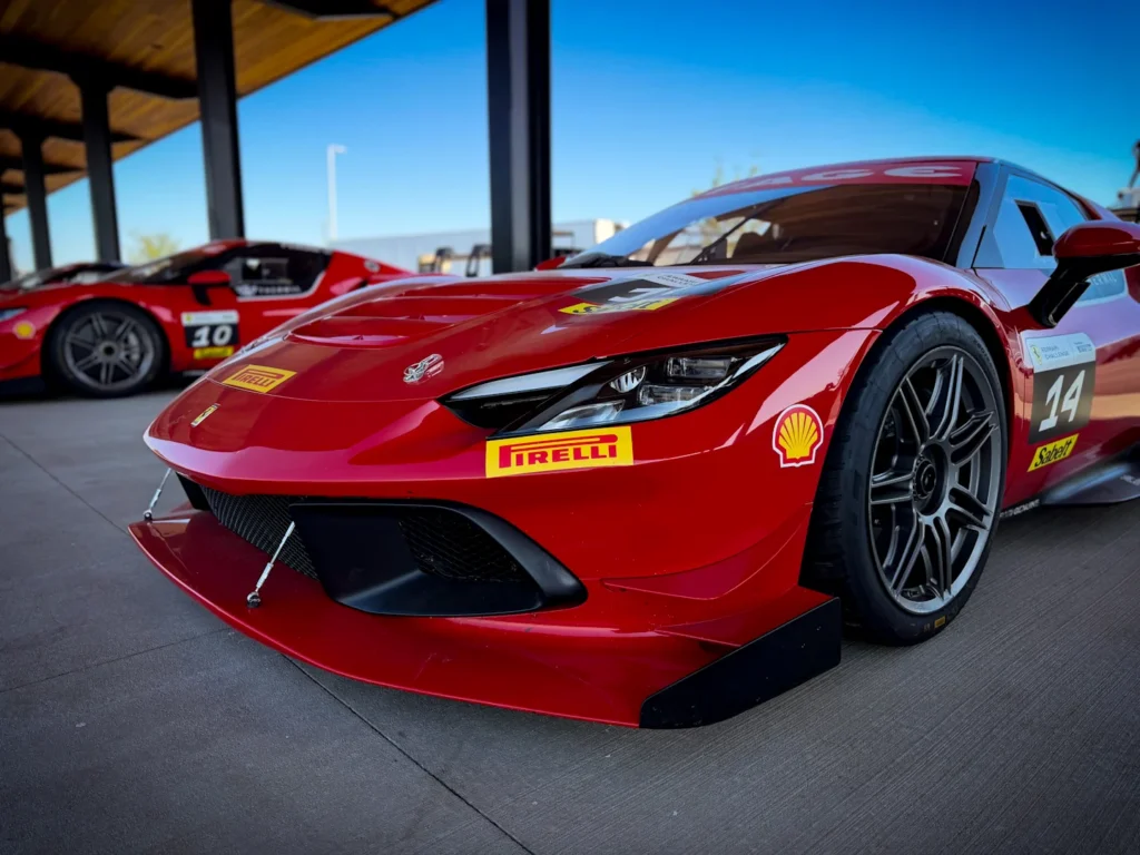 red ferrari at ten tenth motor club events