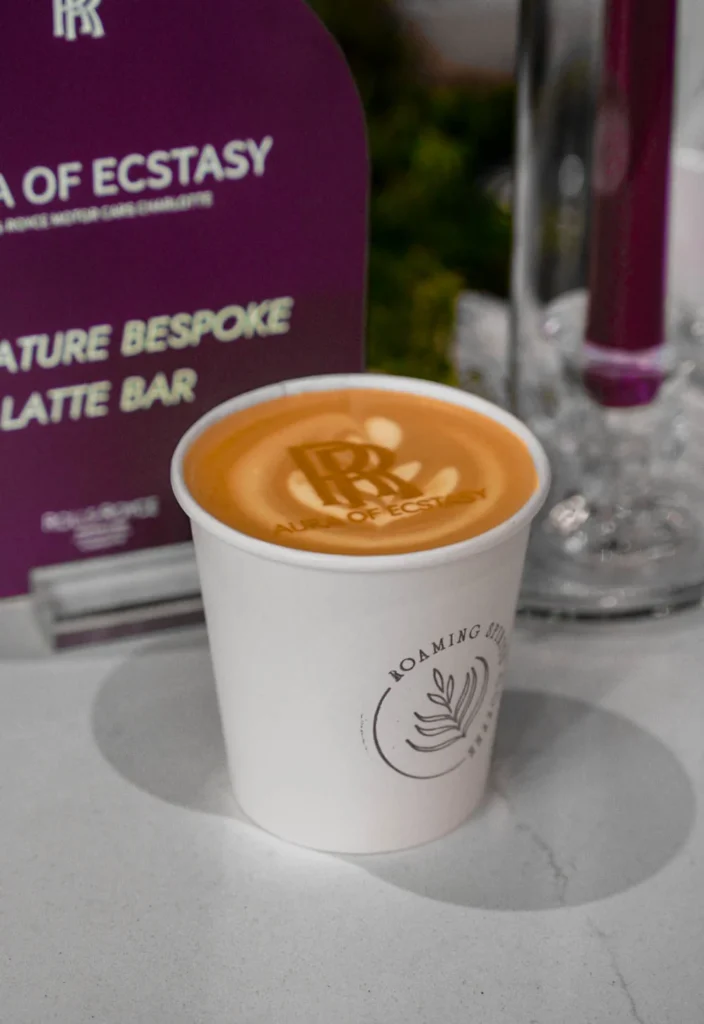 Custom Rolls Royce Signature latte by Roaming Spirits coffee bar